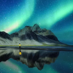 Northern Lights over Vestrahorn Mountain in Stokksnes, Southeast Iceland.